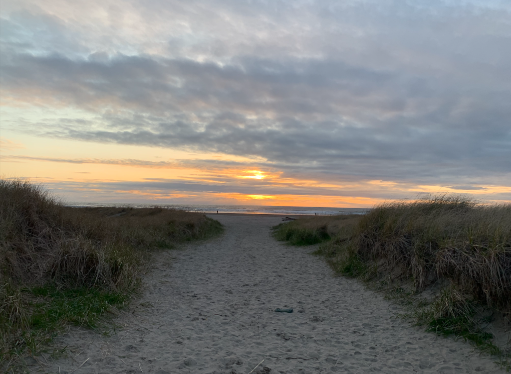 a beach in Oregon during sunset